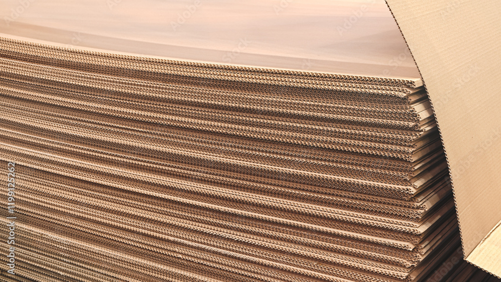 Leinwandbilder a stack of brown cardboard boxes. the boxes are stacked on top of each other and are brown in color