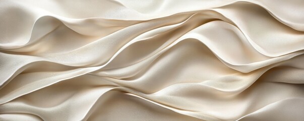Obraz premium Soft beige textured fabric waves creating gentle abstract patterns.