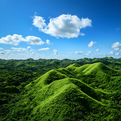 Rolling hills covered in lush greenery, with a brilliant blue sky and a few fluffy clouds floating above