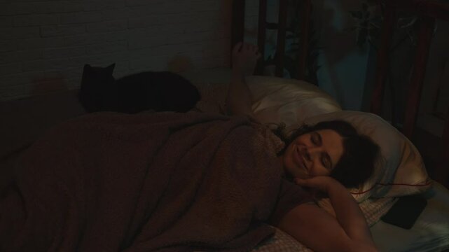 Well slept woman wakes up in good mood early in the morning. Good morning concept.