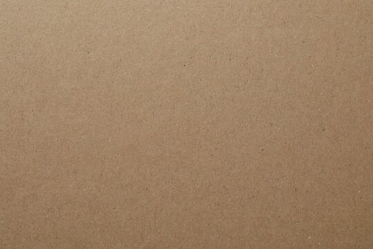 Eco recycle paper, Linen Textured Paper background, grain paper texture, dots, speckles, specks, flecks and particles. Craft repeating wallpaper. Natural cream grunge surface background