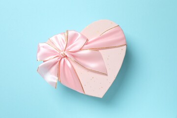 Beautiful gift box on color background