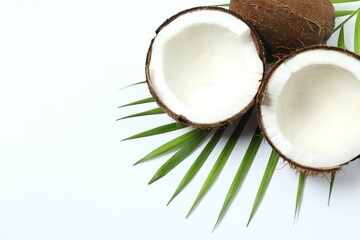 Coconut on color background, top view
