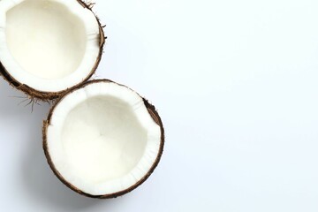 Coconut on white background, top view
