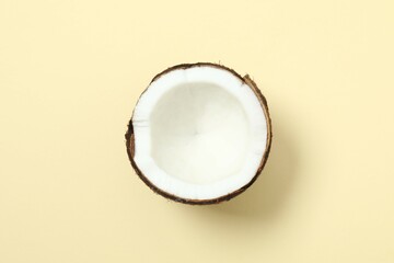 Coconut on color background, top view
