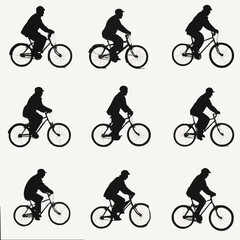 Fototapeta premium 15 silhouettes of people riding bicycles in different positions