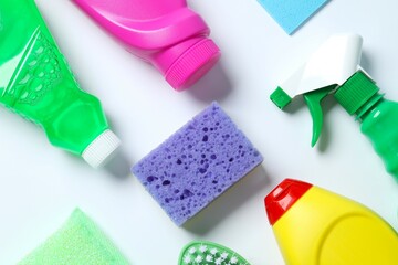 Many different house cleaning products on white background, top view