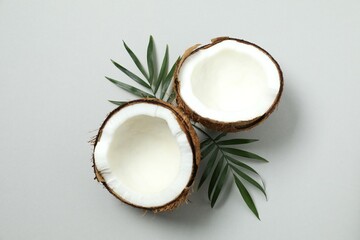 Coconut on gray background, top view