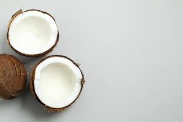 Coconut on gray background, top view