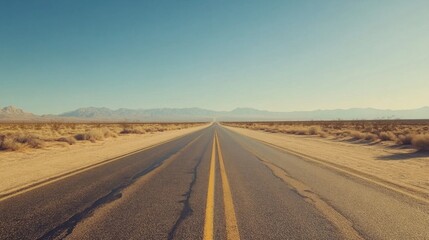 Fototapeta premium Empty Asphalt Road Stretching Through A Desert Landscape