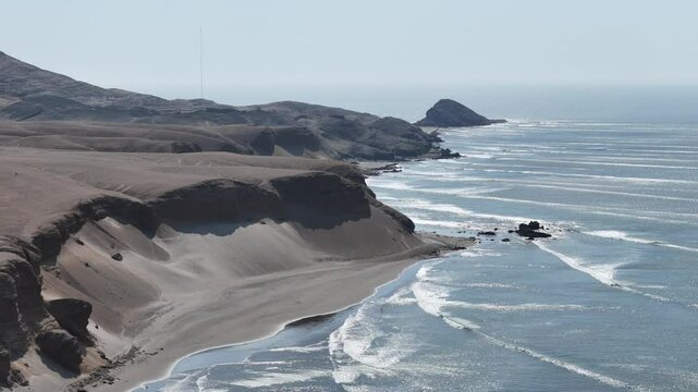 home of the worlds longest left hand surf break in puerto malabrigo or chicama in Peru. clean long breaking waves with beautiful desert landscape. sand dunes and rocky cliffs