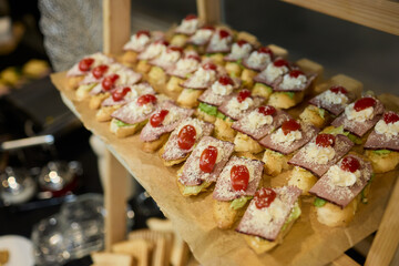 An Elegant Assortment of Gourmet Desserts and Savory Snacks Beautifully Arranged on Table
