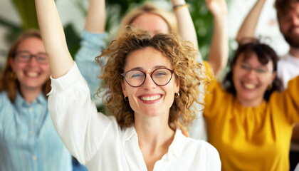 Fototapeta premium A group of happy and successful business professionals celebrating their achievements. They are all smiling and laughing, and some of them are raising their arms in victory.