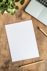A blank note pad and pen on a wooden desk, suggesting organization and creativity.