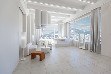 modern pure white interior design of a spacious room features a cozy bed and stylish furniture. Large windows frame a stunning snowy mountain landscape, creating a serene atmosphere during daylight.