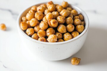 Crunchy roasted chickpeas in white bowl showcase healthy snack o