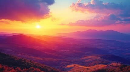 Fototapeta premium Serene sunset over rolling hills with vibrant colors illuminating the sky and distant mountains