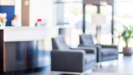 Corporate Lobby Blur – A blurred image of a corporate building lobby with reception and seating.	
