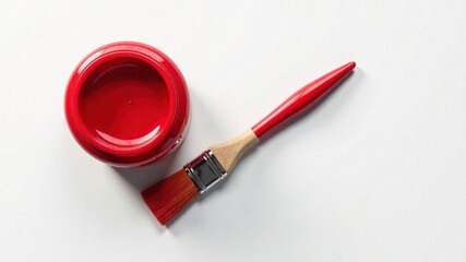 Red Paint Jar and Wooden Brush Top View