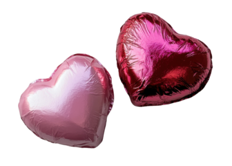 Pink heart-shaped candies arranged on a plain background