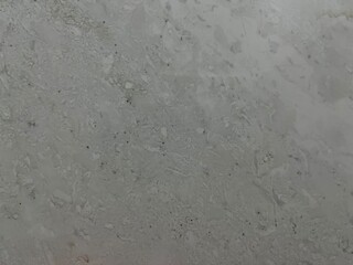 smooth gray marble texture with subtle veins and natural patterns, ideal for interior design, countertops, and modern aesthetic backdrops