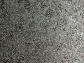 textured gray surface with abstract rough brush strokes and patterns, ideal for background, design elements, and industrial themes