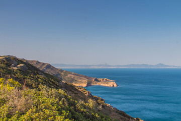 Cliffside Majesty: Mountain, Coastline, and Beach in Takelsa, Tunisia