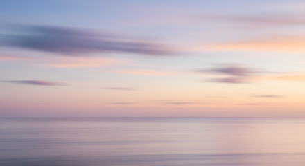 Fototapeta premium Dreamscapes of Dawn: A Muddled Composition of Firmament and Sea 