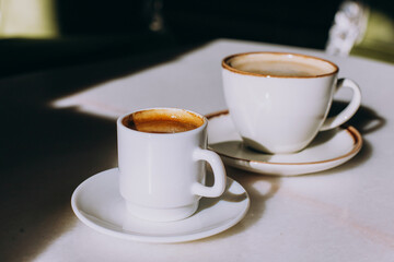 Espresso stands on the table in the cafe, coffee taste, caffeine