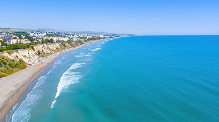 Fototapeta premium Aerial View of Sandy Beach and Azure Ocean