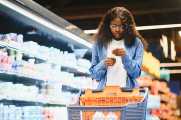 Cheerful African American Woman In Supermarket