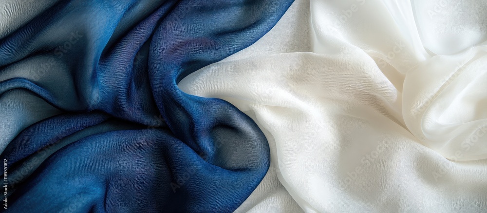 Poster serene composition of flowing white and deep blue fabric drapes on a soft surface, creating an elega