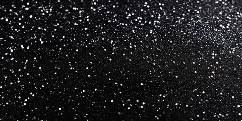 Obraz premium Luxurious Black Glitter Silk Fabric Texture with Shimmering Silver Accents and Space for Text in a Elegant Dark Background