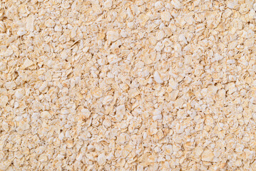 Oat flakes texture background, Food ingredient in oatmeal, muesli or porridge