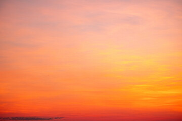 Sky,sunset, beautiful , luxury soft gradient orange gold clouds and sunlight on the blue sky perfect for the background, Sunrise on morning or everning in winter warm time ,Twilight summer,silhouette