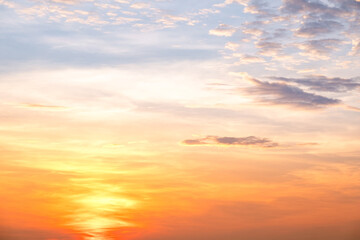 Sky,sunset, beautiful , luxury soft gradient orange gold clouds and sunlight on the blue sky perfect for the background, Sunrise on morning or everning in winter warm time ,Twilight summer,silhouette