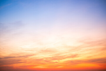 Sky,sunset, beautiful , luxury soft gradient orange gold clouds and sunlight on the blue sky perfect for the background, Sunrise on morning or everning in winter warm time ,Twilight summer,silhouette