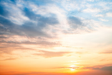 Sky,sunset, beautiful , luxury soft gradient orange gold clouds and sunlight on the blue sky perfect for the background, Sunrise on morning or everning in winter warm time ,Twilight summer,silhouette