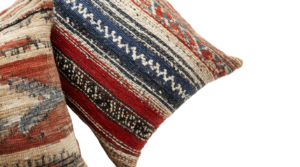 Two beautifully patterned decorative pillows with intricate designs resting together on a white isolated background, perfect for home decor.