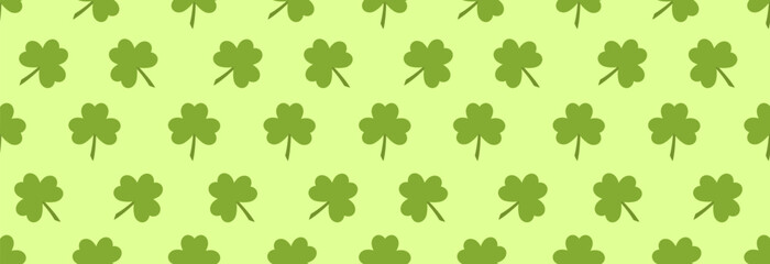 Clover leaf icon on green background. Seamless pattern.
