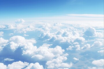 Naklejka premium Up High in the Sky: Stunning View of Clouds, Nature and Blue Sky from Airplane Window at Flight Altitude