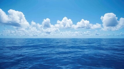 Obraz premium Serene Ocean Scene Under A Blue Sky With Fluffy Clouds