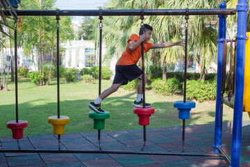 A boy is having fun in the park.