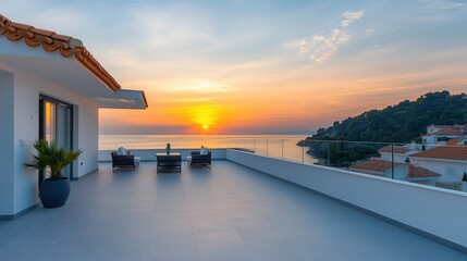 Fototapeta premium Luxury hotel interior showcasing exclusive architecture. Sunset view from a modern terrace overlooking the sea.