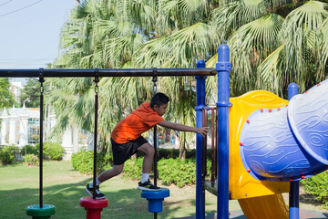 A boy is having fun in the park.