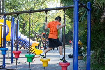 A boy is having fun in the park.