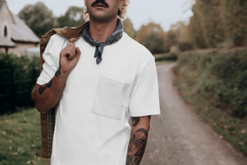 T-shirt png mockup on casual men's fashion outdoor shoot