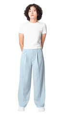 Fototapeta premium Woman png mockup in white tee and blue loose pants casual fashion