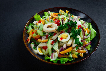salad with squid, fresh cucumber, eggs, sweet pepper, red onion, with dressing, homemade, no people,