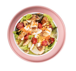 bowl of fresh salad with cubes of tomato chicken and lettuce isolated on pink ceramic top view